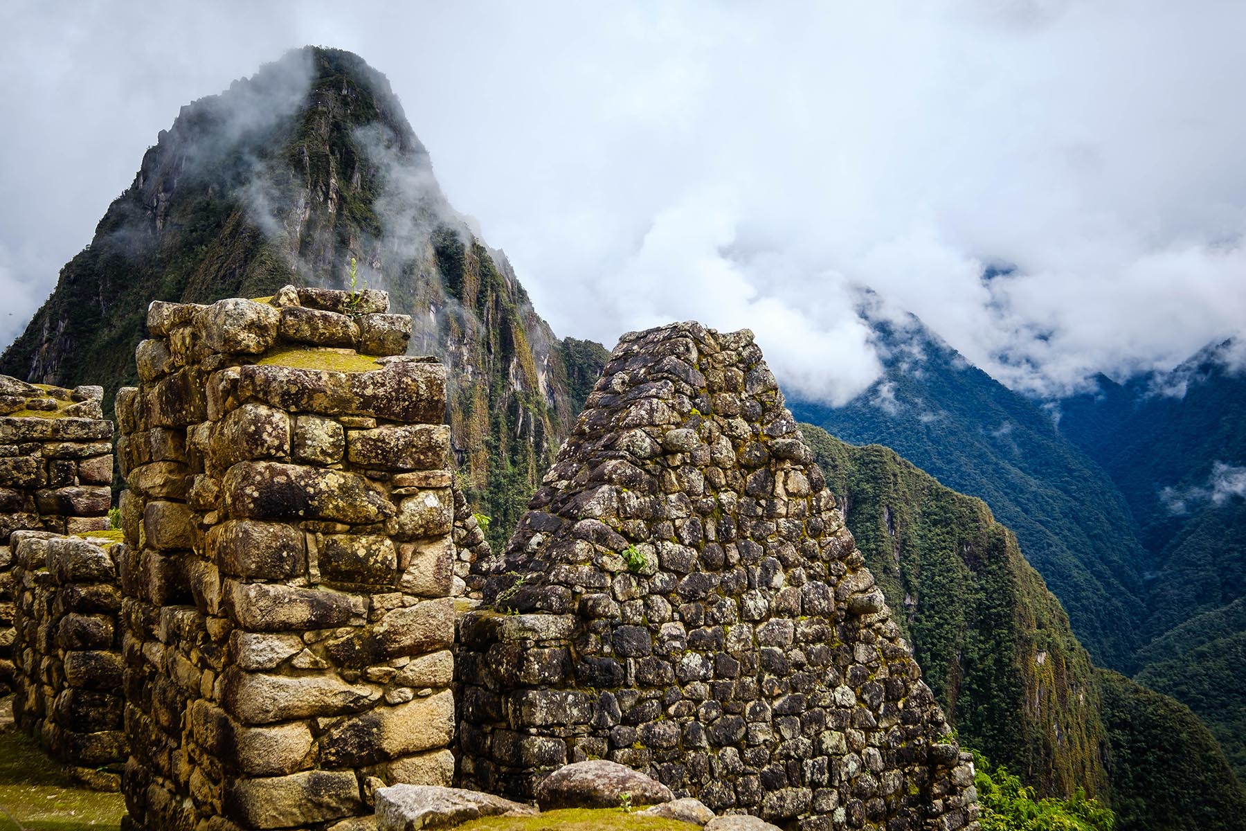 Why are there three entrance routes to Machu Picchu?